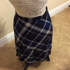 Flowy plaid skirt. Sweater-like. Thin.